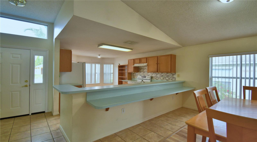 At the other end of the kitchen is an area to put a dinette set.