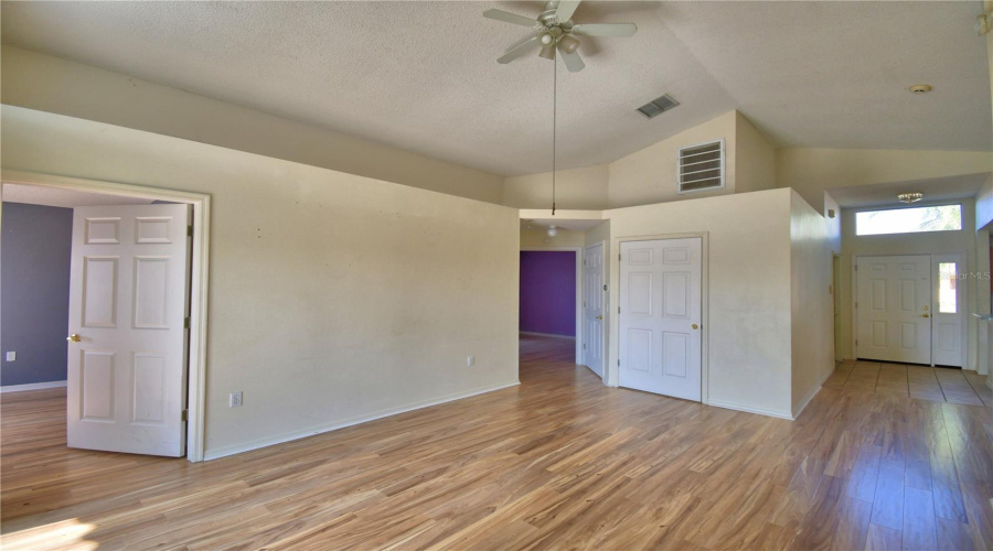 The other three bedrooms are located on the other side of the living room.