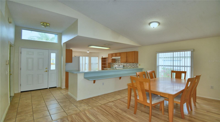 Breakfast bar and dining room provide lots of space to feed a lot of people.