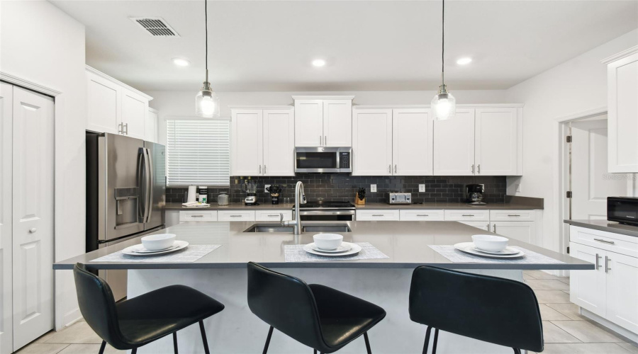 KISSIMMEE, Florida 34746, 5 Bedrooms Bedrooms, ,5 BathroomsBathrooms,Residential,For Sale,RHYME,0,MFRO6321428