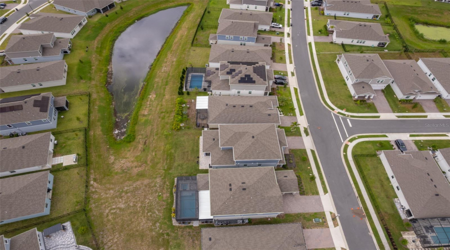 Aerial view of the property and neighborhood