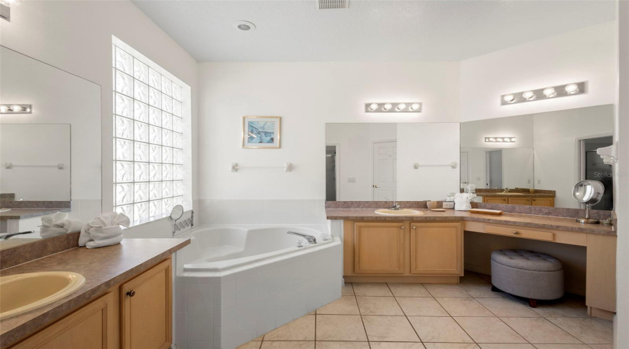 Large Primary Bathroom, two vanities & prep area!