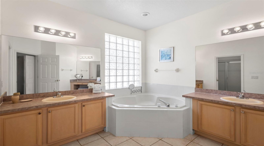 Soaker tub in primary bathroom