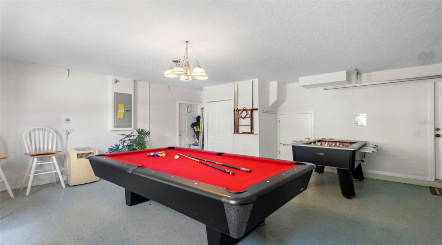 2 Car Garage Currently Used as a Game Room