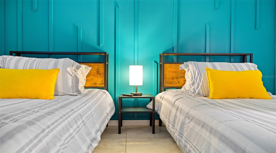 Bedroom 2 with feature wall