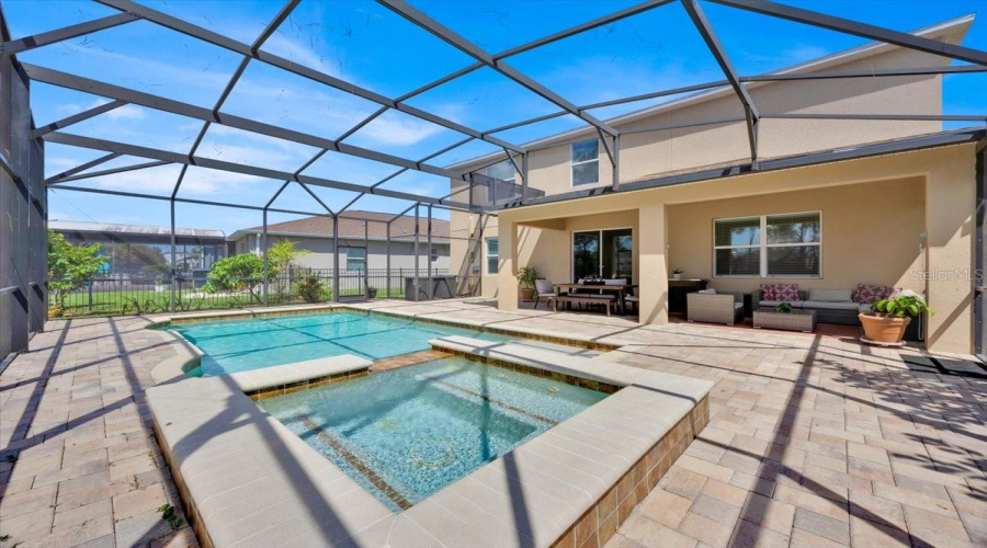 Covered porch and screened pool area