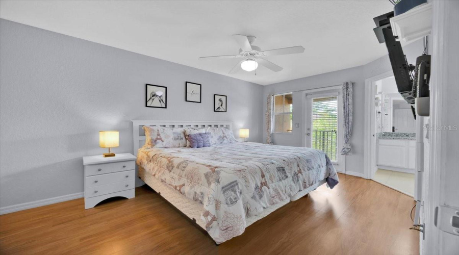 2nd Fl primary bedroom w/attached balcony