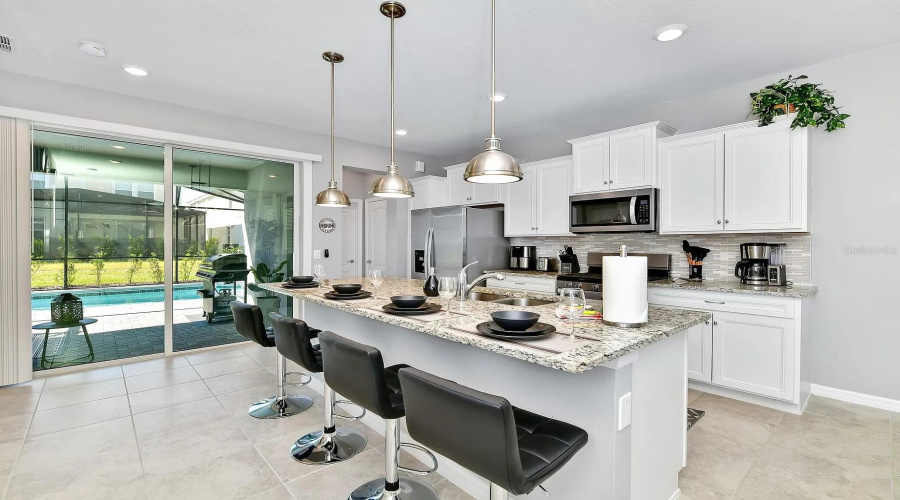 DAVENPORT, Florida 33837, 5 Bedrooms Bedrooms, ,4 BathroomsBathrooms,Residential,For Sale,OAKMOSS,0,MFRO6340341