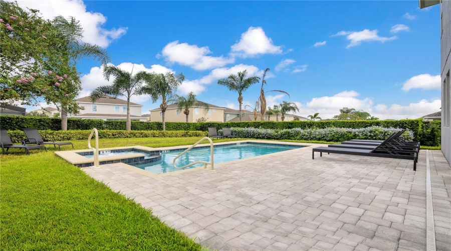 Large Pool Deck with Plenty of Outdoor Seating