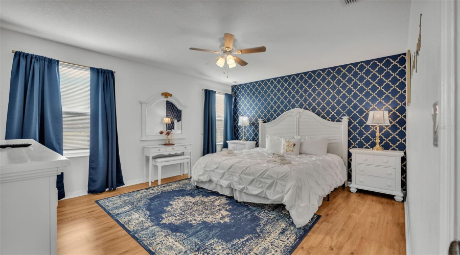 Be Our Guest inspired primary bedroom.