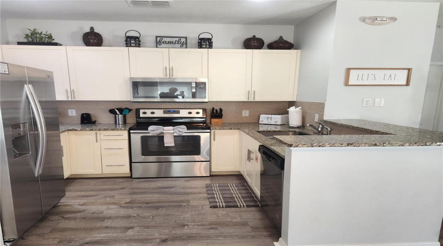 Kitchen with all Stainless Steel Appliances