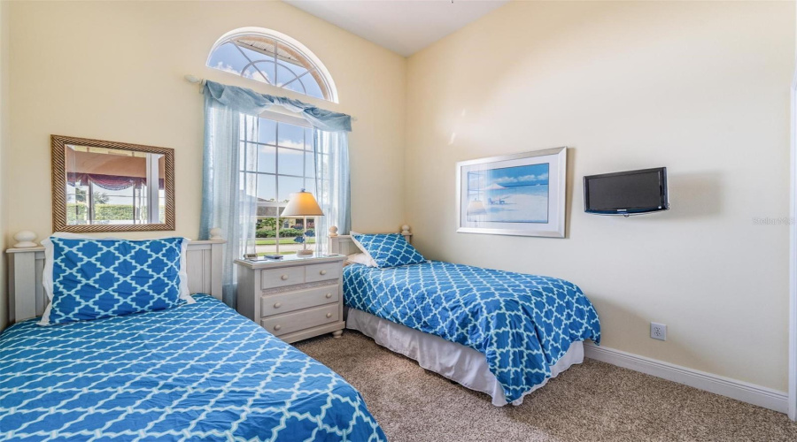 The second bedroom, located off the living room, also offers a prime spot as a home office.