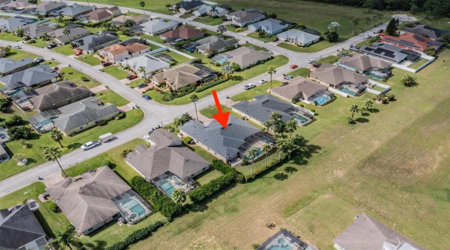 An easement behind the home ensures no direct rear neighbors, providing added privacy.
