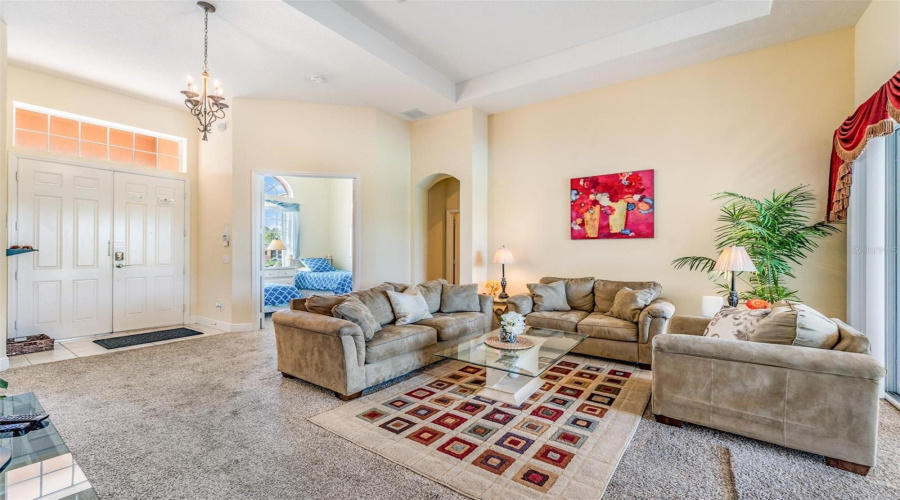 As you move toward the great room and look back toward the entry, the entrances to the second bedroom/office and living room come into view.