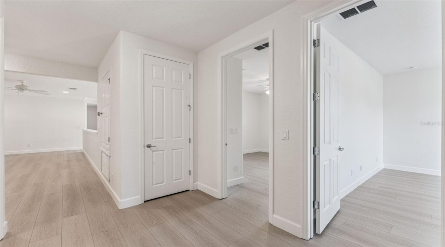 Upstairs nook outside both guest bedrooms with flexible space ideal for a workstation, study spot, or gaming area.