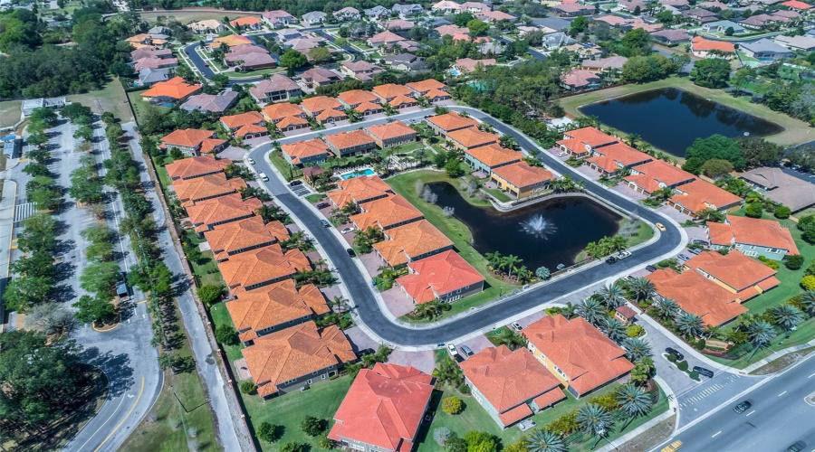 Aerial view of Point Cypress, a small, gated townhome community with beautifully maintained grounds — all in a prime Orlando location near world-class dining, shopping, and attractions.