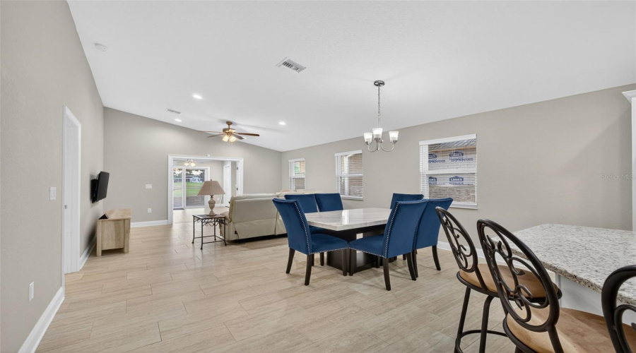 Dining Area: Open concept dining – flows seamlessly into kitchen and living areas.