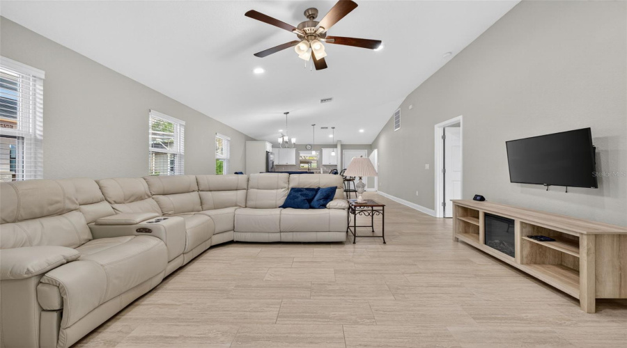 Living Room: Spacious open-concept living area, perfect for relaxing or entertaining.