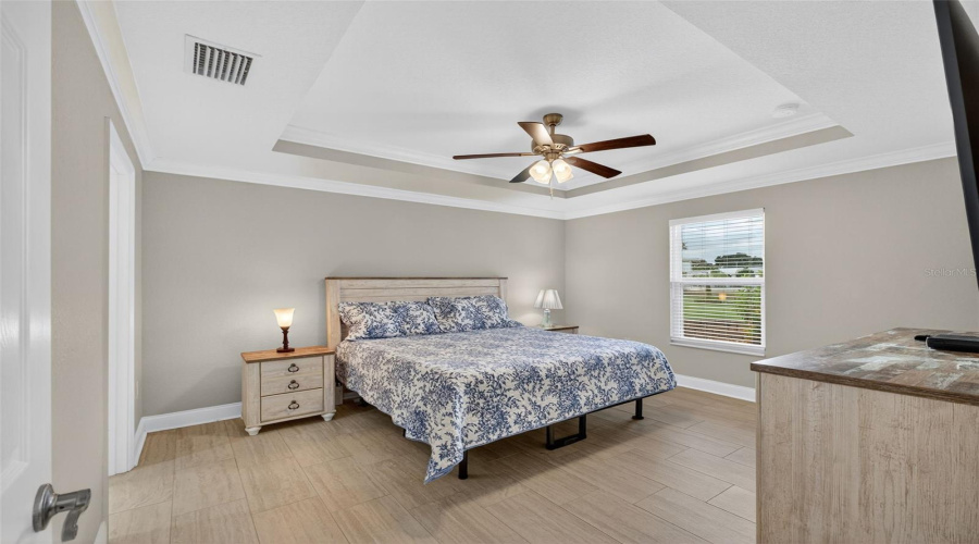 Primary Bedroom:Bright and comfortable primary bedroom with private en-suite bath.