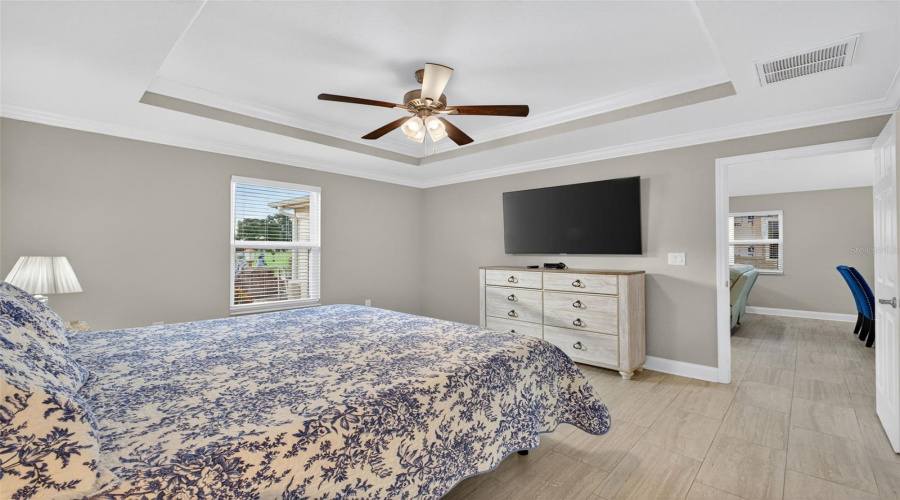 Primary Bedroom: Comfortable primary suite offering privacy and natural light.