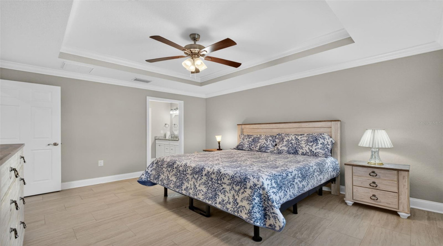Primary Bedroom:Bright and comfortable primary bedroom with private en-suite bath.