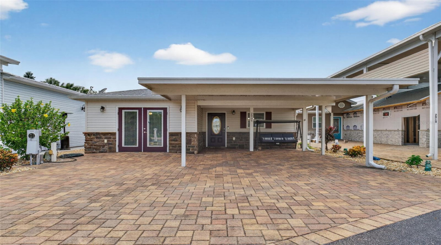 Front Exterior: Welcome to your 2020 home in the gated Deer Creek Golf & RV Community - clean, modern curb appeal.