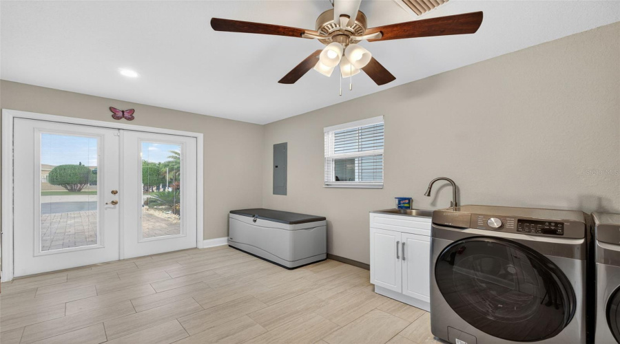 Flex Room / Converted Utility: Versatile bonus room, perfect as a third bedroom, office, or hobby space.