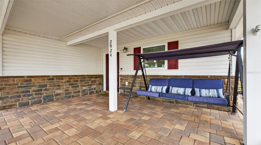 Front Patio : Covered front patio offers charm and functionality with easy outdoor living.