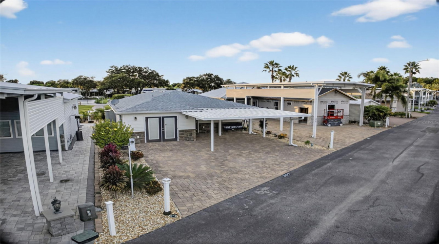 Parking: Dedicated carport ensures shade and added convenience for residents and guests.