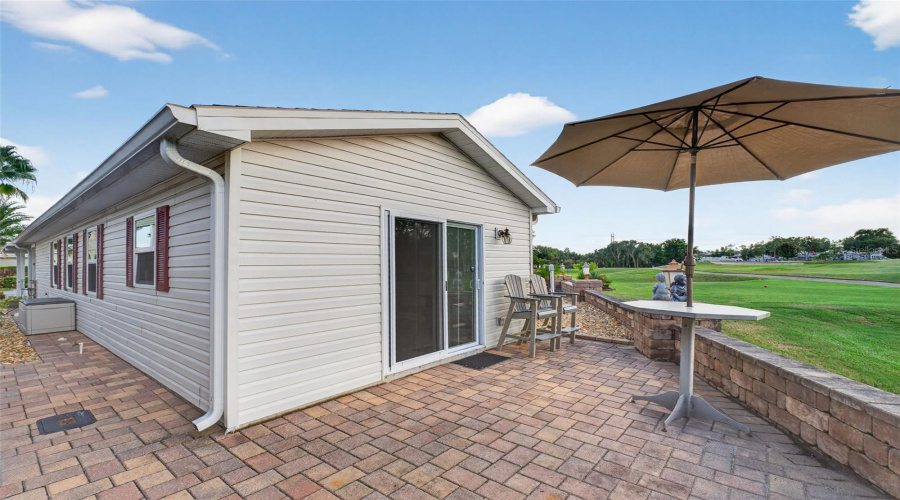 Backyard: Enjoy Florida living outdoors with this versatile backyard retreat.