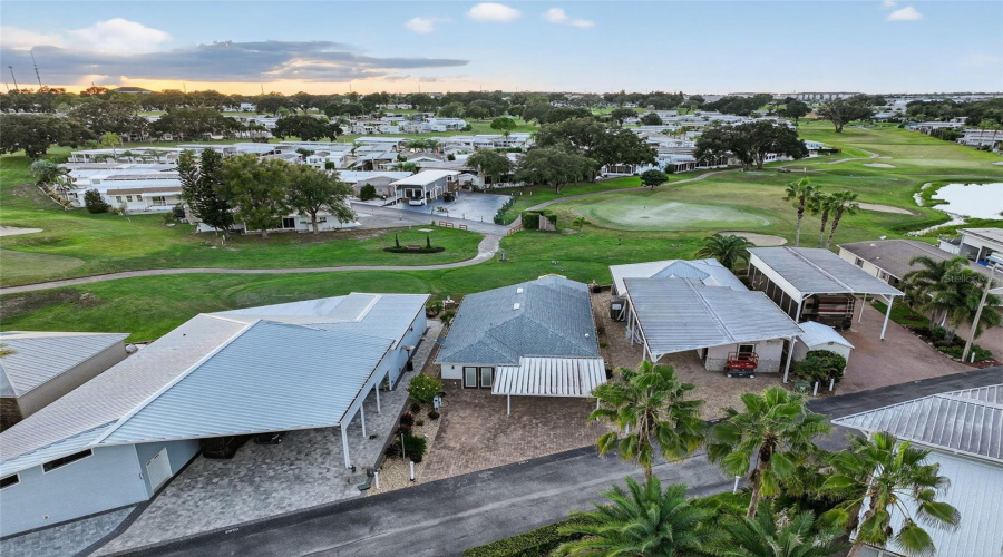 Overhead view reveals the home’s setting in a beautifully maintained, gated neighborhood.