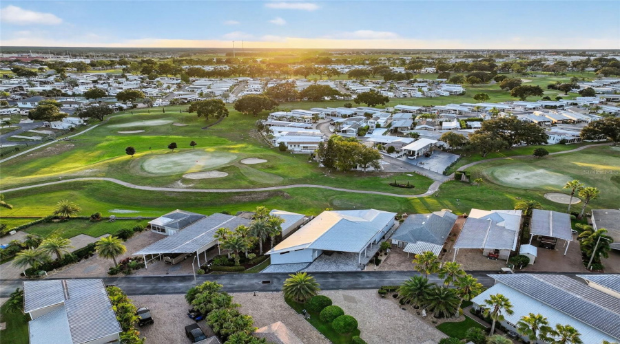 Overhead view reveals the home’s setting in a beautifully maintained, gated neighborhood.