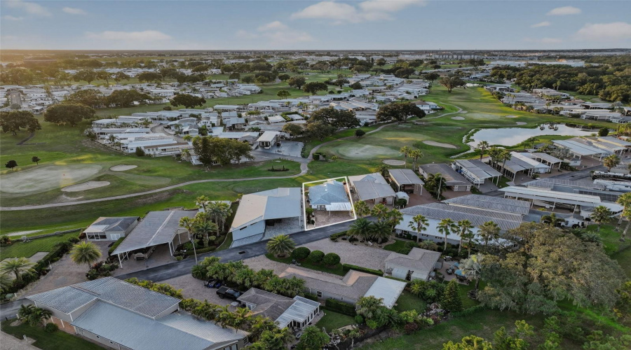 Bird’s-eye view showcasing the home’s prime location within Deer Creek Golf & RV.