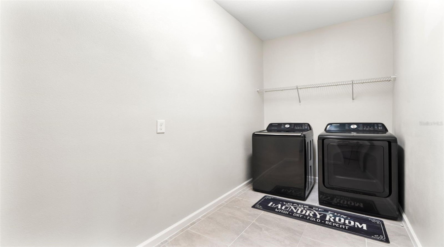 First floor laundry room with built in laundry chute for convenience!