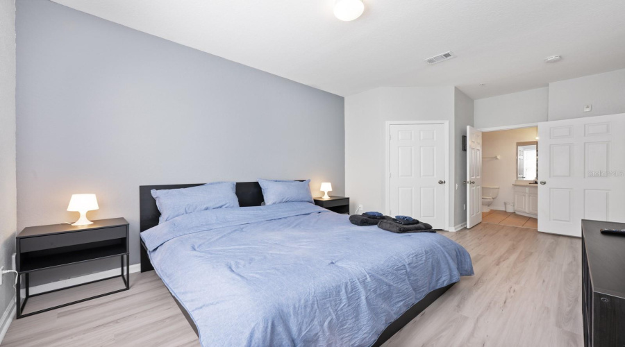 The Primary suite offers an en suite bath and privacy from the other two bedrooms thanks to a SPLIT-BEDROOM DESIGN.
