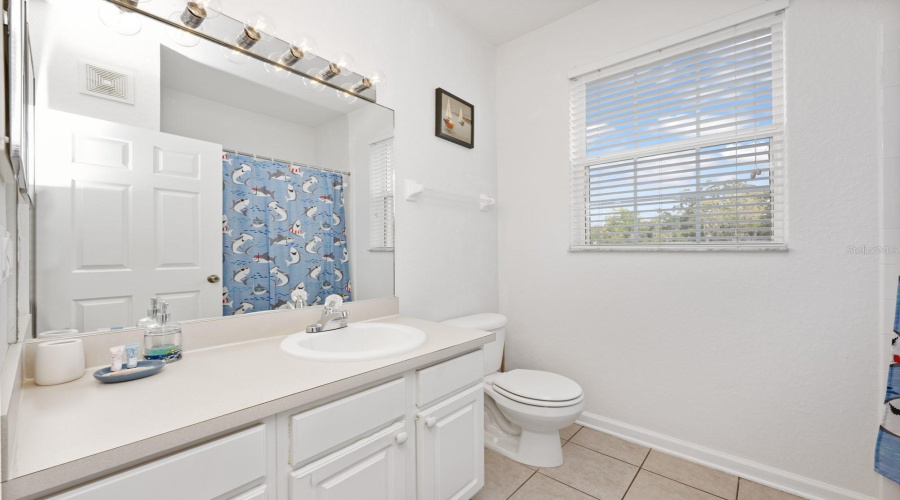 The second Bath serves as a full guest bath, offering comfort and convenience for visitors.