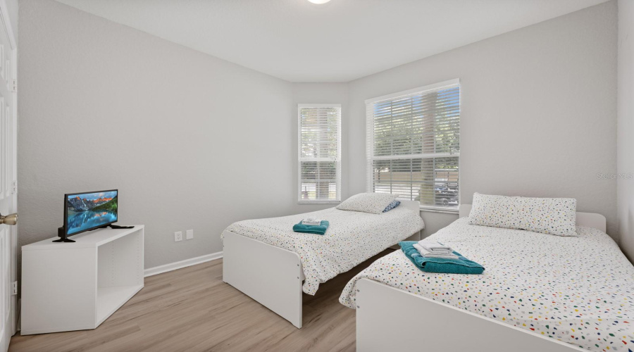 Bedroom 3 provides flexibility for use as guest room, home office or hobby space.