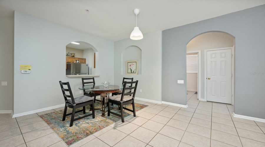 Inside, the condo’s architectural design shines with ELEGANT ARCHED DOORWAYS and decorative cutouts that add character and charm.