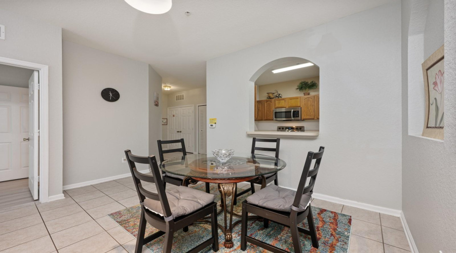 The charming Dining area is perfect for casual meals or quiet dinners at home.