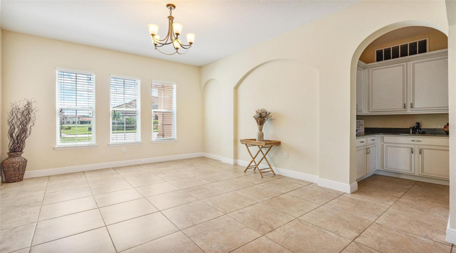 The formal dining room is conveniently located adjacent to the Butler's pantry and gourmet kitchen.