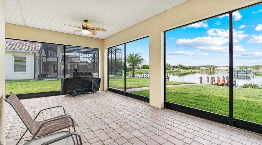 The screened first floor lanai leads you to your private boat dock.
