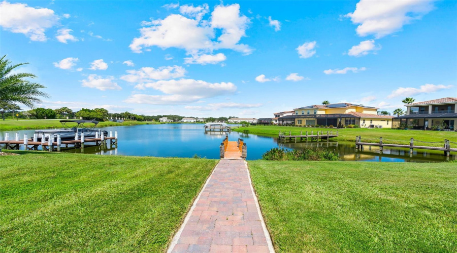 Brick paver walkway to your private boat dock.