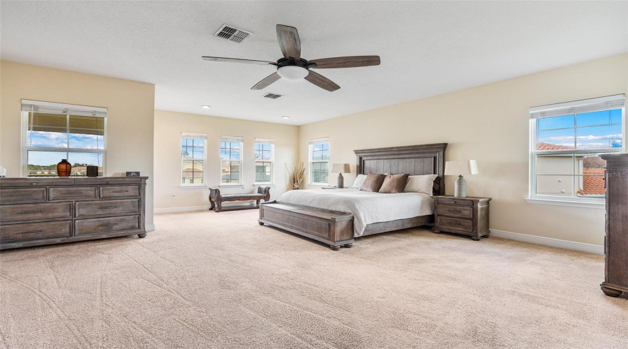 Wake up to elevated & serene water views from your master retreat privately located in a split floor plan configuration.