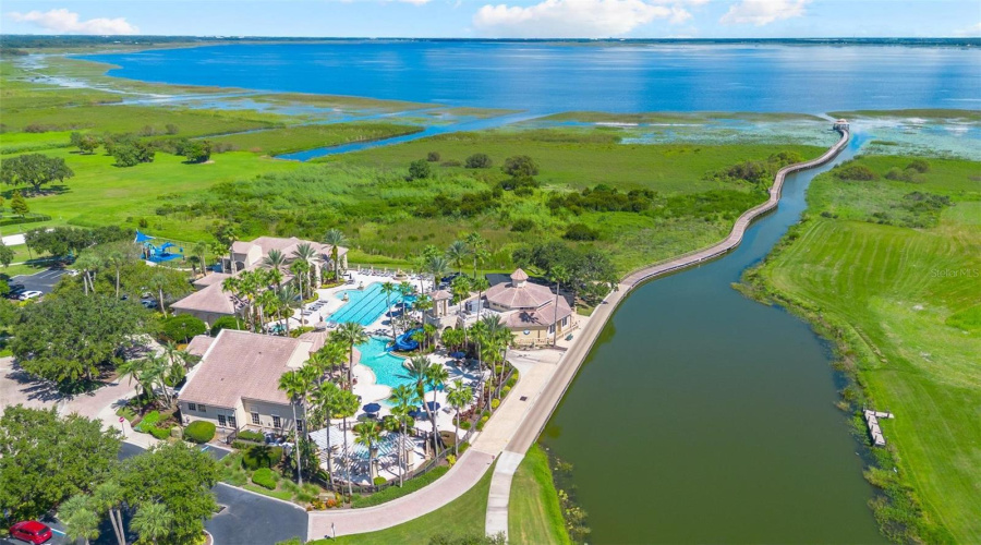 The Bellalago Amenities Center features 2 resort style swimming pools, one with a water slide and another for laps.