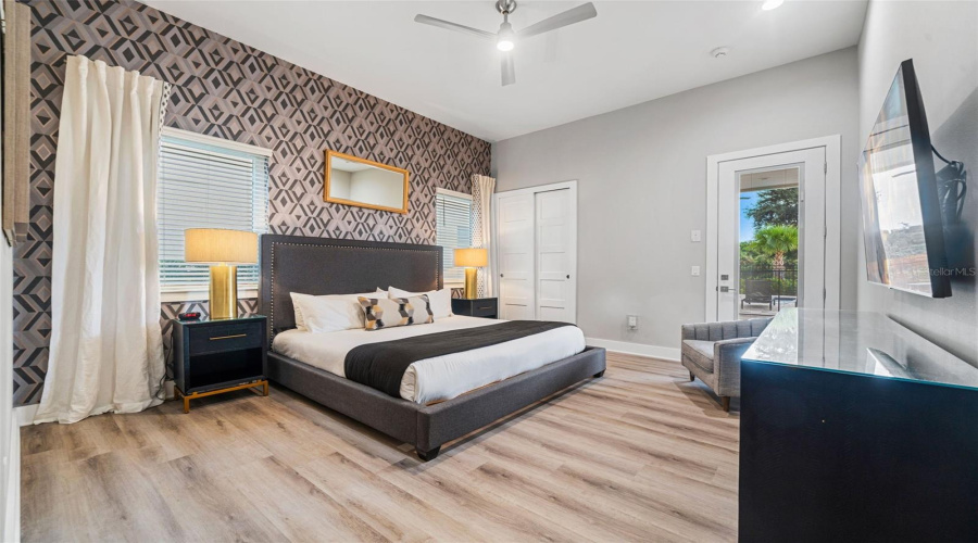 Man Floor owner Suite with Access to Outdoor Living Area