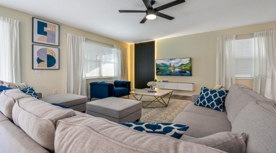 Family Room + Dining Room: Integrated, open space ideal for gatherings and meals.