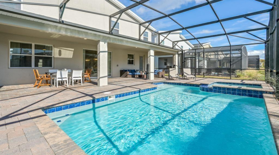 Private Pool + Spa: Located at the rear of the property.