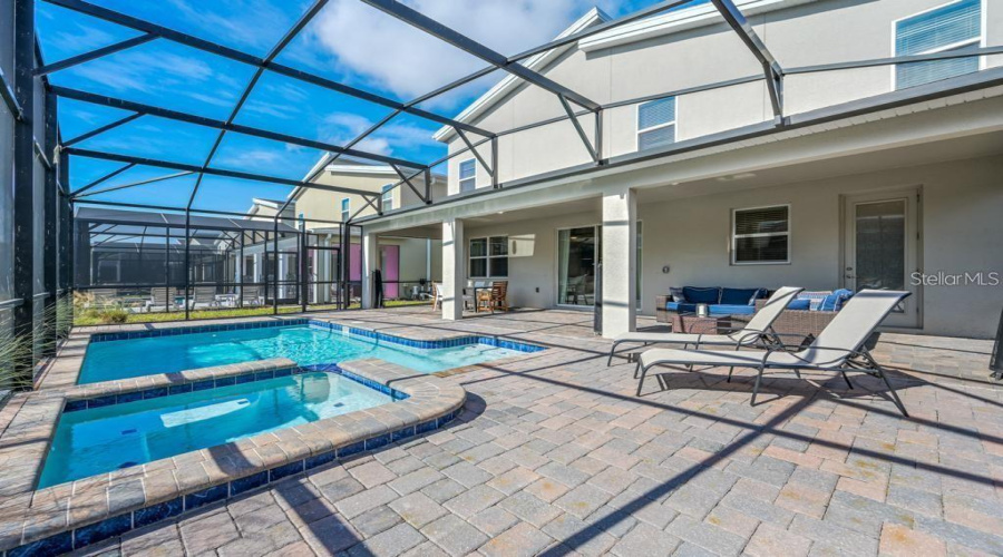 Private Pool + Spa: Located at the rear of the property.