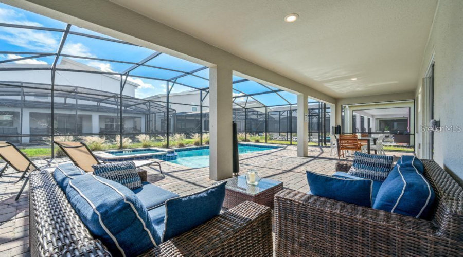 Covered Patio: Seamlessly connected to the main living areas.