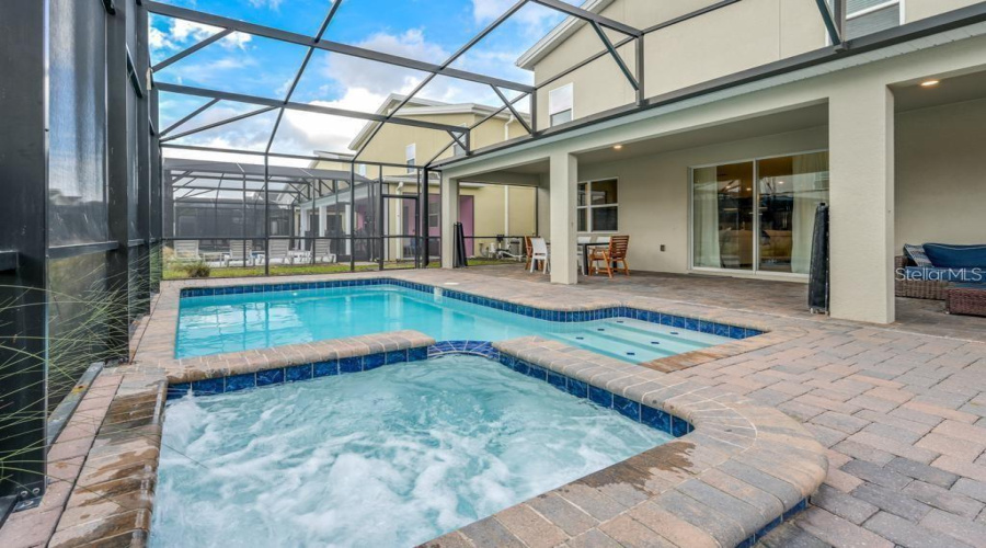 Private Pool + Spa: Located at the rear of the property.